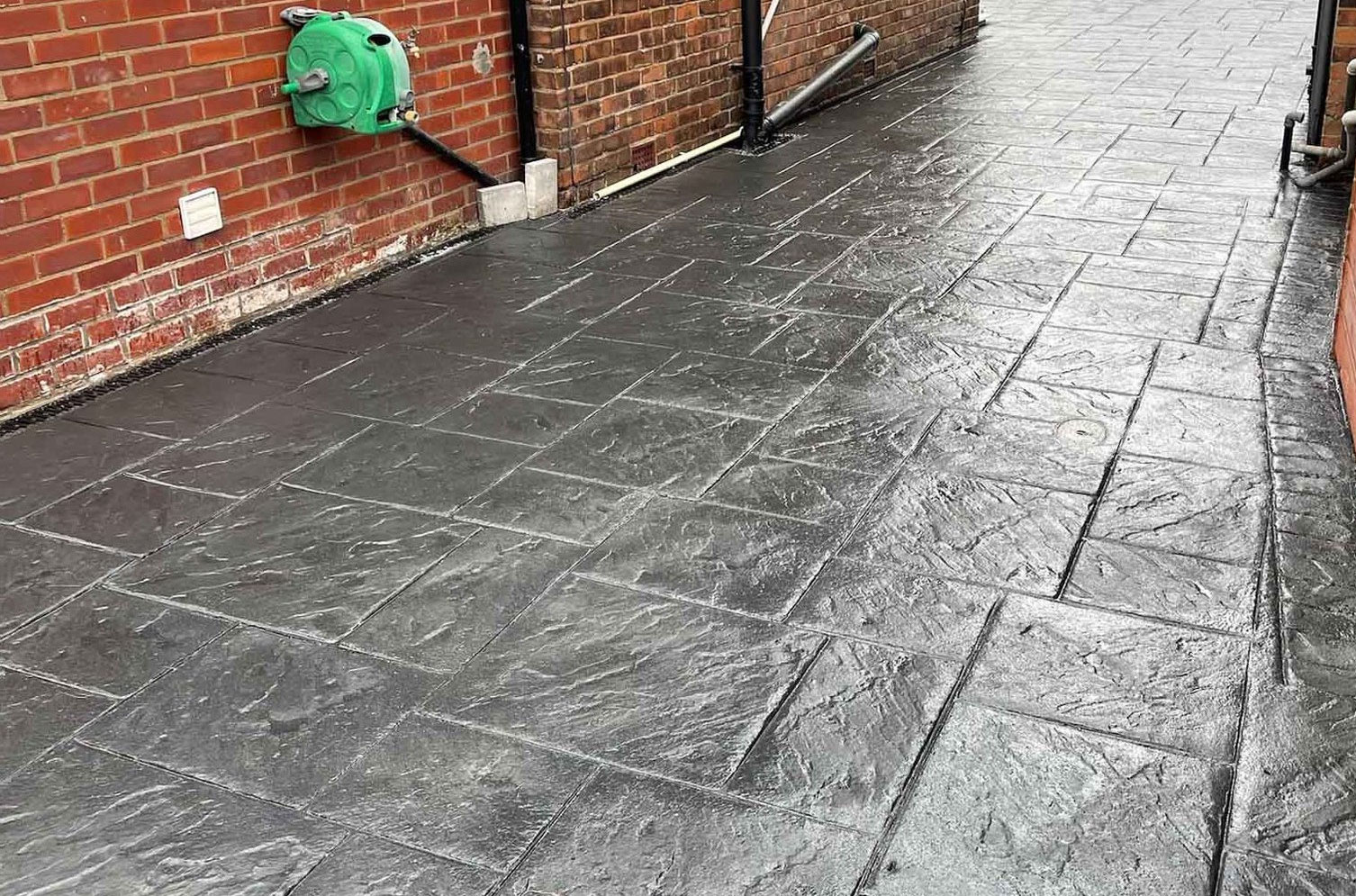 JJ Property Maintenance: Your Experts in Concrete Imprint Driveway Cleaning and Resealing